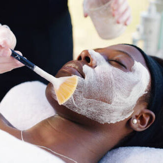 Cropped shot of an attractive young woman getting a facial treatment at a day spa